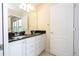 Bathroom with double sinks and granite countertop at 8841 Rhodes St, Kissimmee, FL 34747