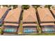 Aerial view showcasing houses with pools and screened enclosures at 8841 Rhodes St, Kissimmee, FL 34747