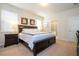 Spacious Primary bedroom with large bed and en-suite bathroom access at 8841 Rhodes St, Kissimmee, FL 34747