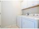 Bright laundry room with washer and dryer included at 8841 Rhodes St, Kissimmee, FL 34747