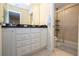 Bathroom with double vanity, granite countertop and shower at 8841 Rhodes St, Kissimmee, FL 34747