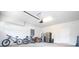 Garage with bikes and storage at 8841 Rhodes St, Kissimmee, FL 34747