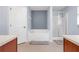 Bathroom features a soaking tub, shower, and double vanity at 24714 Martin St, Eustis, FL 32736