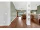 Open living room with hardwood floors and neutral color palette at 24714 Martin St, Eustis, FL 32736