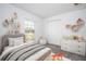 bedroom with built-in shelving and playful decor at 4278 Green Gables Pl, Kissimmee, FL 34746