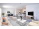 Open concept living room, kitchen, and dining area with modern finishes at 4278 Green Gables Pl, Kissimmee, FL 34746