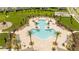 Resort-style pool with plenty of lounge chairs at 4278 Green Gables Pl, Kissimmee, FL 34746