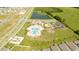 Aerial view of community pool, playground, and clubhouse at 4278 Green Gables Pl, Kissimmee, FL 34746