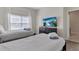 Bedroom with two twin beds, large TV and window at 4838 Romeo Cir, Kissimmee, FL 34746