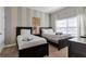Bedroom with two twin beds and a shared bathroom at 4838 Romeo Cir, Kissimmee, FL 34746