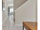 Light hallway with tile floors leading to living areas at 4838 Romeo Cir, Kissimmee, FL 34746