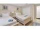 Charming bedroom with two twin-size beds, nightstand, and ample closet space at 4838 Romeo Cir, Kissimmee, FL 34746