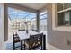 Outdoor patio with table and chairs, overlooking the pool at 4838 Romeo Cir, Kissimmee, FL 34746