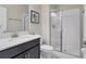 Bathroom with a walk-in shower and modern vanity at 4838 Romeo Cir, Kissimmee, FL 34746