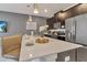Modern kitchen with quartz countertops and island at 4838 Romeo Cir, Kissimmee, FL 34746
