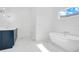 Elegant bathroom with freestanding tub, marble flooring, and modern vanity at 1840 Biscayne Dr, Winter Park, FL 32789