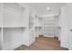 Large walk-in closet with ample shelving and hanging space at 1840 Biscayne Dr, Winter Park, FL 32789