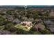 An aerial view showcasing the house's location in a residential neighborhood at 10527 Emerald Chase Dr, Orlando, FL 32836