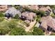 Bird's-eye view of the house nestled among other homes at 10527 Emerald Chase Dr, Orlando, FL 32836
