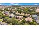 Wide shot of house and surrounding neighborhood from above at 10527 Emerald Chase Dr, Orlando, FL 32836