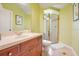 Small bathroom with single sink vanity and shower at 10527 Emerald Chase Dr, Orlando, FL 32836