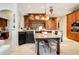 Island kitchen with granite countertops and breakfast nook at 10527 Emerald Chase Dr, Orlando, FL 32836