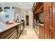 Gourmet kitchen with granite countertops and high-end stainless steel appliances at 10527 Emerald Chase Dr, Orlando, FL 32836