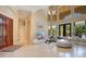 Spacious living room featuring high ceilings and a light and airy feel at 10527 Emerald Chase Dr, Orlando, FL 32836