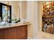 Wine cellar with wooden wine rack and metal gate at 10527 Emerald Chase Dr, Orlando, FL 32836