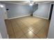 Spacious living room with tile floors and neutral-toned walls at 1123 Spring Meadow Dr # 1123, Kissimmee, FL 34741