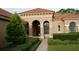 Beautiful two-story home with tile roof and landscaping at 136 Osprey Hammock Trl, Sanford, FL 32771