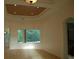 Bright dining room with large window and pool view at 136 Osprey Hammock Trl, Sanford, FL 32771