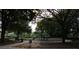 Community playground nestled among mature trees at 136 Osprey Hammock Trl, Sanford, FL 32771