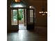 Elegant entryway with tiled floors and access to backyard at 136 Osprey Hammock Trl, Sanford, FL 32771