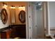 Bathroom with double vanity and access to shower at 136 Osprey Hammock Trl, Sanford, FL 32771