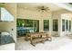 Stainless steel appliances and granite countertops highlight this outdoor kitchen at 10193 Brocksport Cir, Gotha, FL 34734