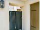 Black slatted gate next to garage at 10193 Brocksport Cir, Gotha, FL 34734