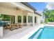 Enjoy the refreshing pool and relaxing patio, perfect for outdoor entertaining at 10193 Brocksport Cir, Gotha, FL 34734