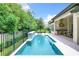 Enjoy this refreshing pool with water features at 10193 Brocksport Cir, Gotha, FL 34734
