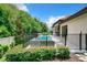 Private backyard oasis with a fenced pool at 10193 Brocksport Cir, Gotha, FL 34734