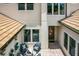 Private courtyard with seating area and fire pit at 10193 Brocksport Cir, Gotha, FL 34734