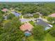 Aerial view of a luxury home community with a pond at 277 Olivia Rose Ct, Lake Mary, FL 32746