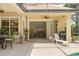 Spacious patio with pool access and views of the backyard at 277 Olivia Rose Ct, Lake Mary, FL 32746