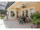 Covered patio with seating area, perfect for outdoor dining at 277 Olivia Rose Ct, Lake Mary, FL 32746