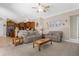 Open concept living room with kitchen views and comfortable seating at 277 Olivia Rose Ct, Lake Mary, FL 32746