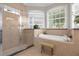 Spa-like bathroom featuring a soaking tub and a separate shower at 277 Olivia Rose Ct, Lake Mary, FL 32746