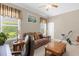 Relaxing home office with built in shelving and a view of the garden at 277 Olivia Rose Ct, Lake Mary, FL 32746