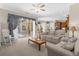Relaxing living room with access to the pool area and kitchen at 277 Olivia Rose Ct, Lake Mary, FL 32746