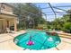 Inviting freeform pool with a spa and a screened enclosure at 277 Olivia Rose Ct, Lake Mary, FL 32746