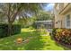 Spacious backyard with a fire pit and screened pool area at 277 Olivia Rose Ct, Lake Mary, FL 32746